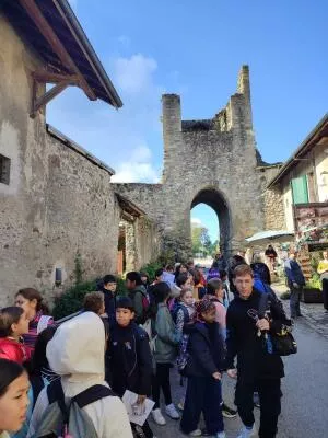 Yvoire fortifications with a group of children